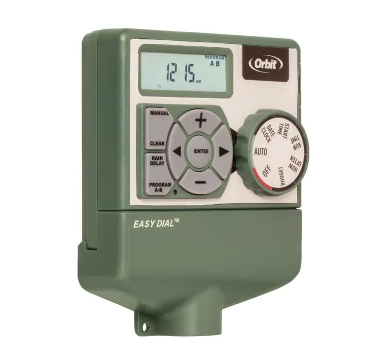 Orbit Easy Dial installed in garage near outlet demonstrating convenient indoor placement