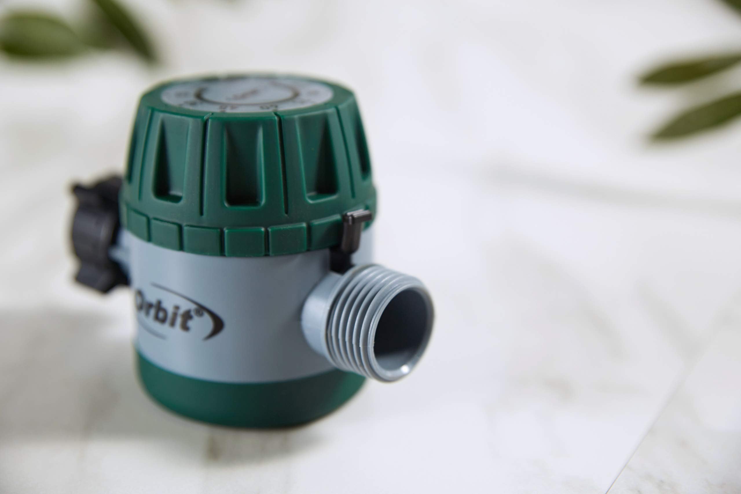 Orbit size comparison with hand demonstrates compact design for convenient handling