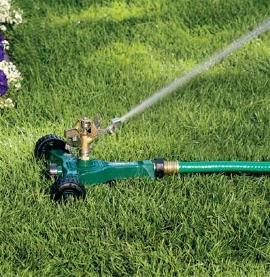Orbit sprinkler spray pattern in use demonstrating even watering benefit