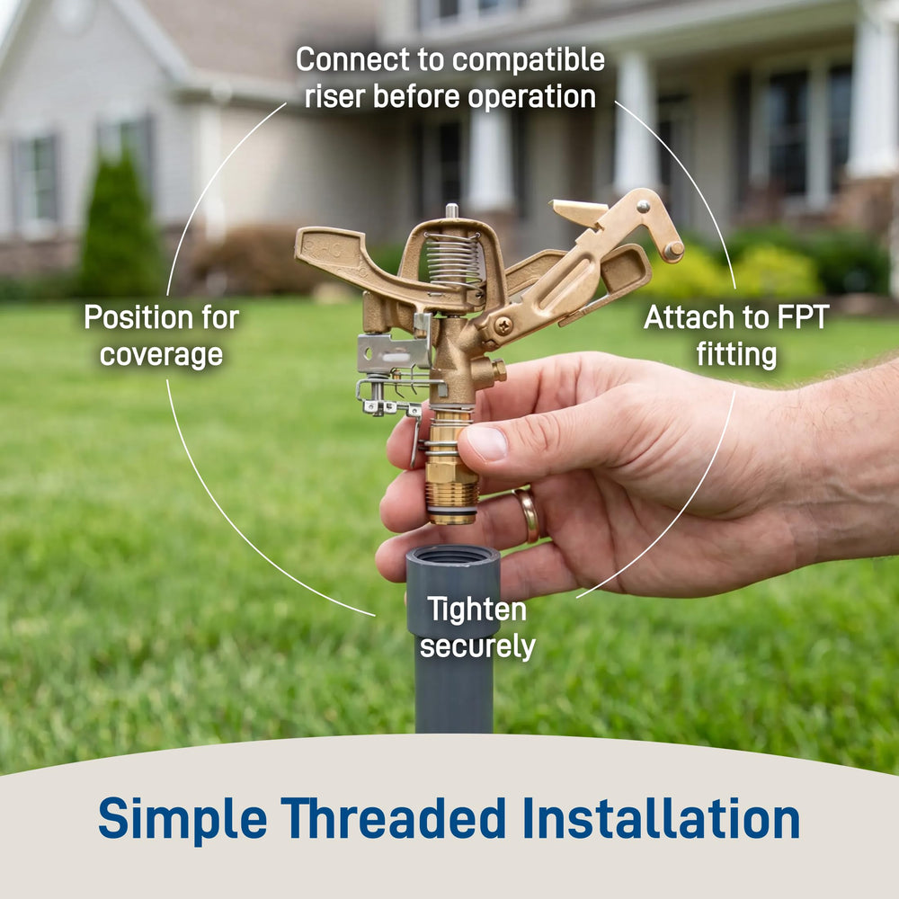 Orbit sprinkler spraying a full arc showing even distribution across lawn area