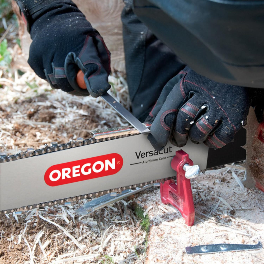 Oregon felling wedge beside flat file to prevent bar pinching and true edges