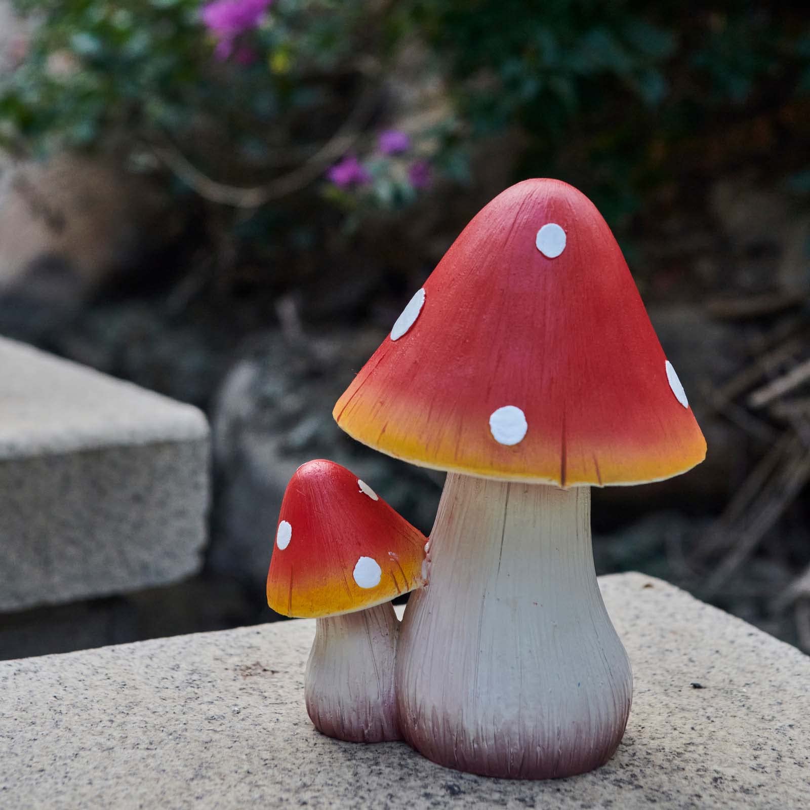 ORIGARDEN mushroom on patio among plants showing a whimsical outdoor accent