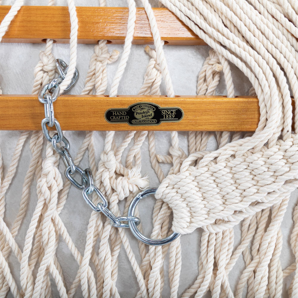 Original Pawleys Island hammock hung on a porch creating a comfortable shaded retreat