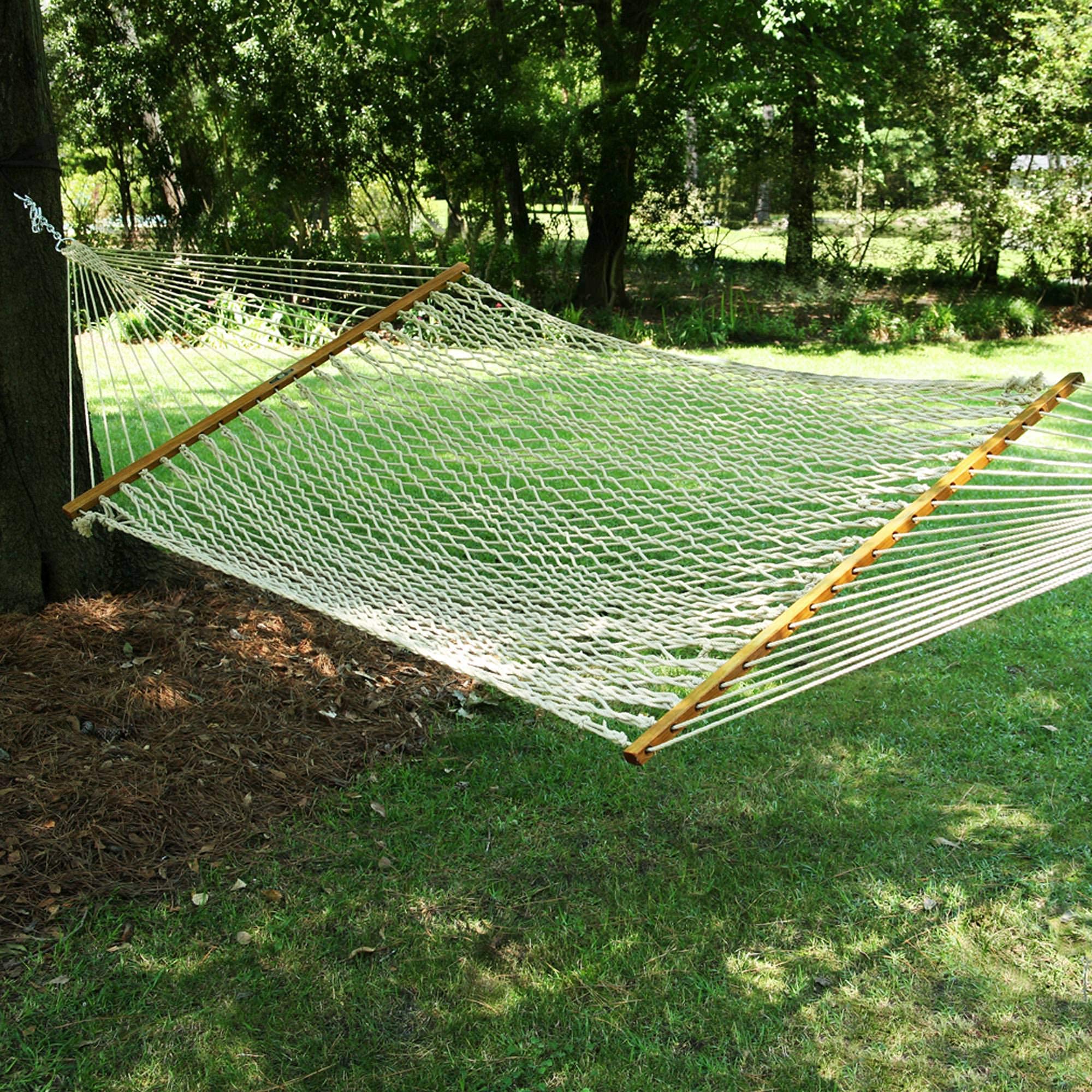 Original Pawleys Island hammock beside a chair to show 13 ft length scale