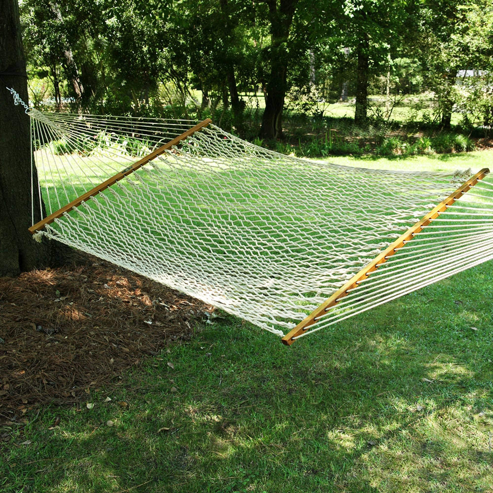 Original Pawleys Island hammock beside a chair to show 13 ft length scale
