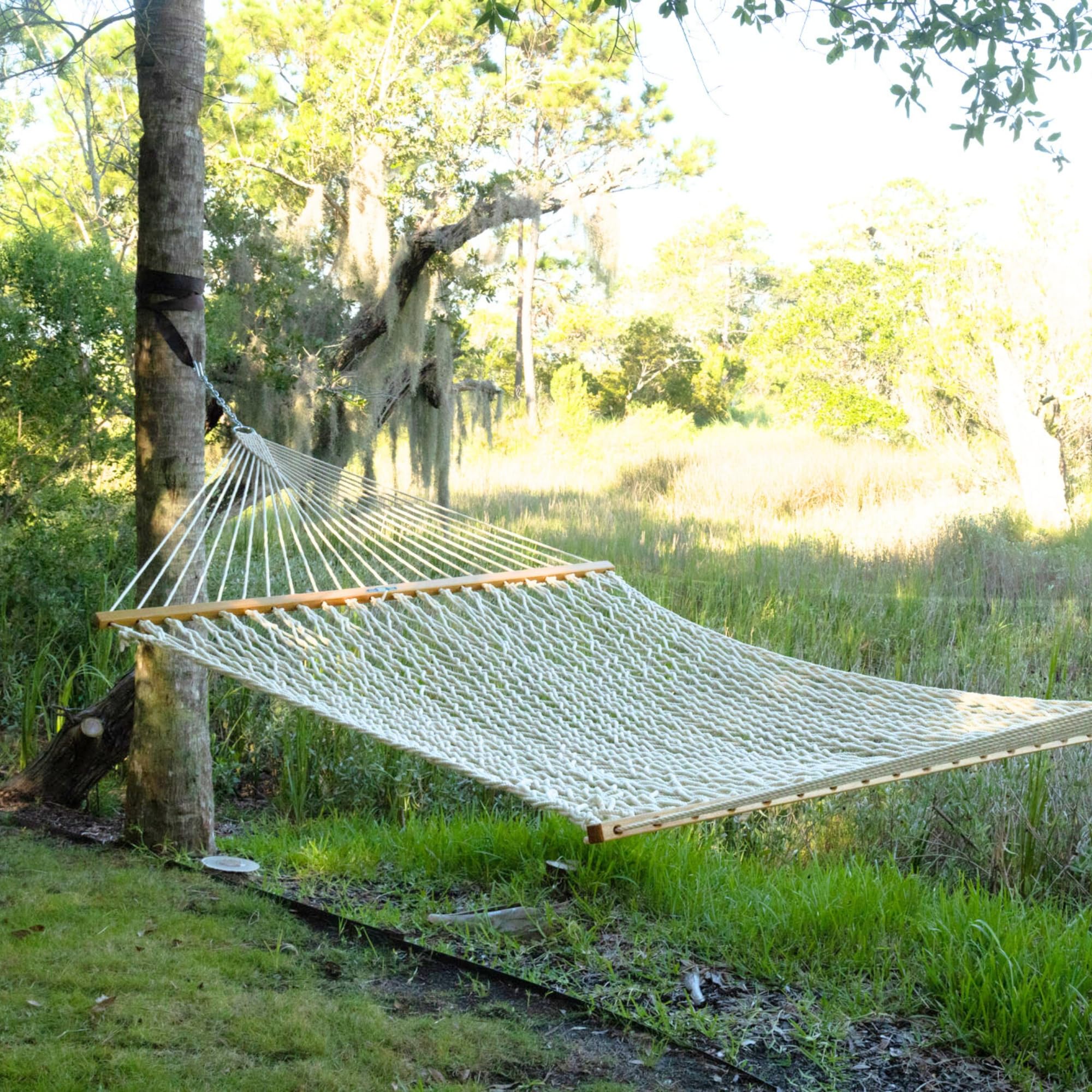 Original Pawleys Island two people lounging to show roomy design and stable support