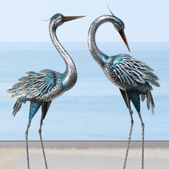 Oritty front view of blue heron statue showing elegant pose and visual impact