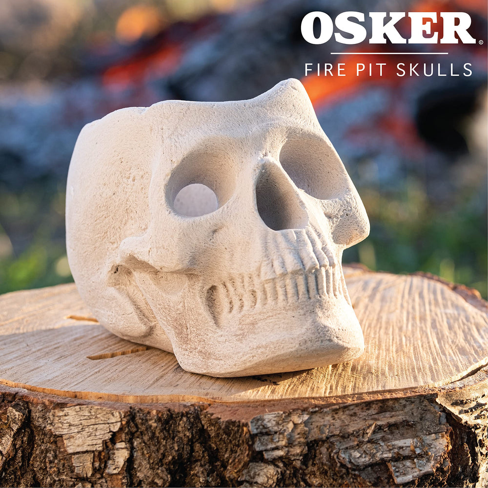 OSKER skull placed in a backyard fire pit creating lively party atmosphere