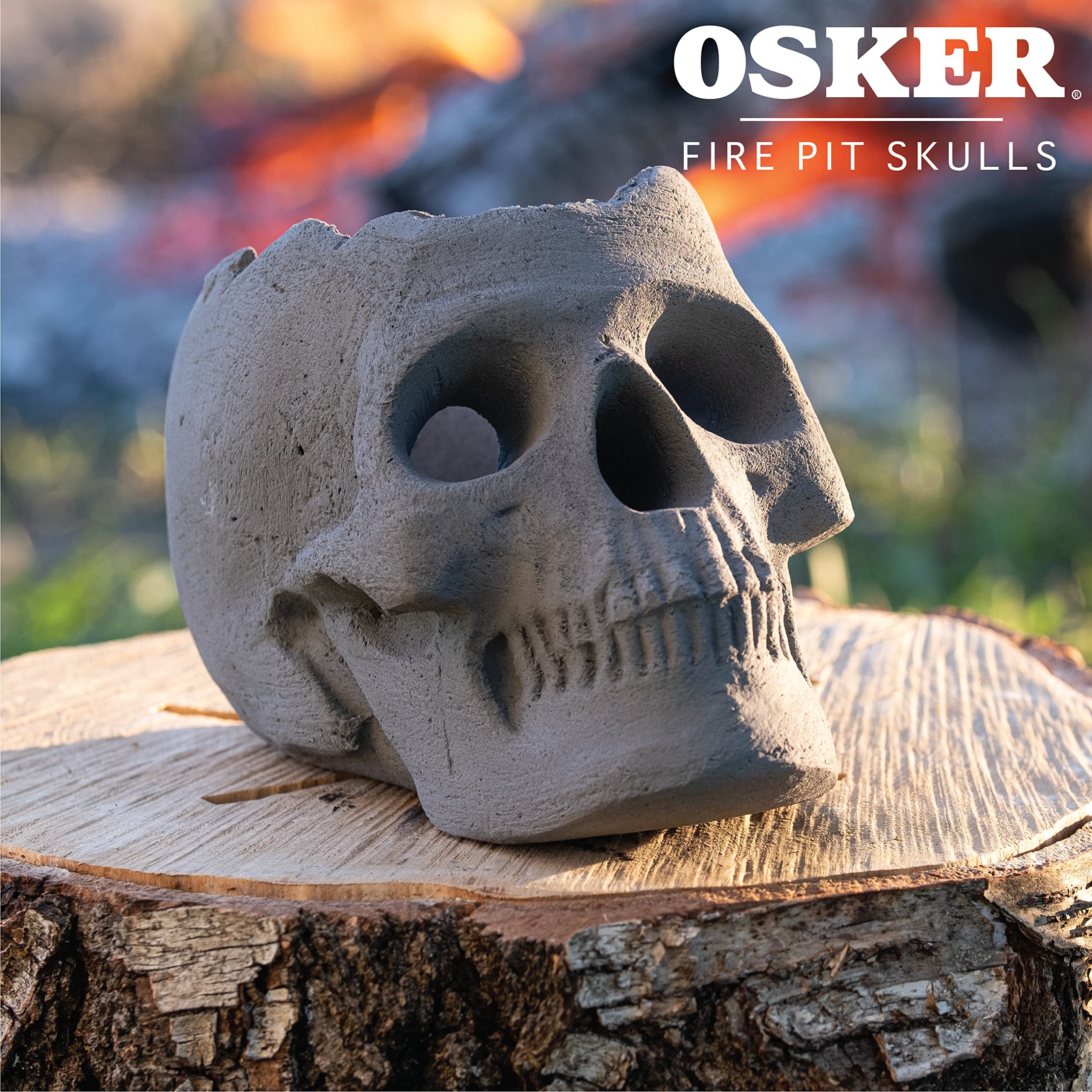 OSKER skull placed in a backyard firepit creating party atmosphere