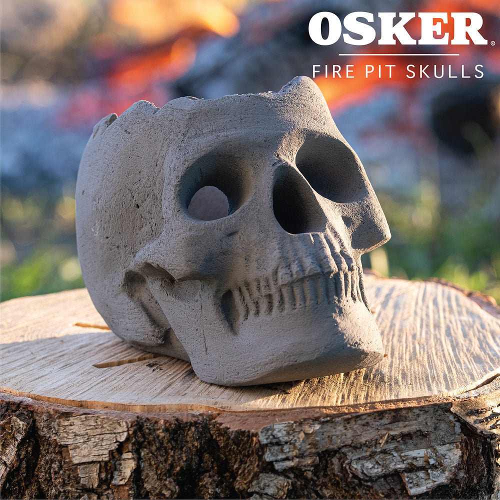OSKER skull placed in a backyard firepit creating party atmosphere