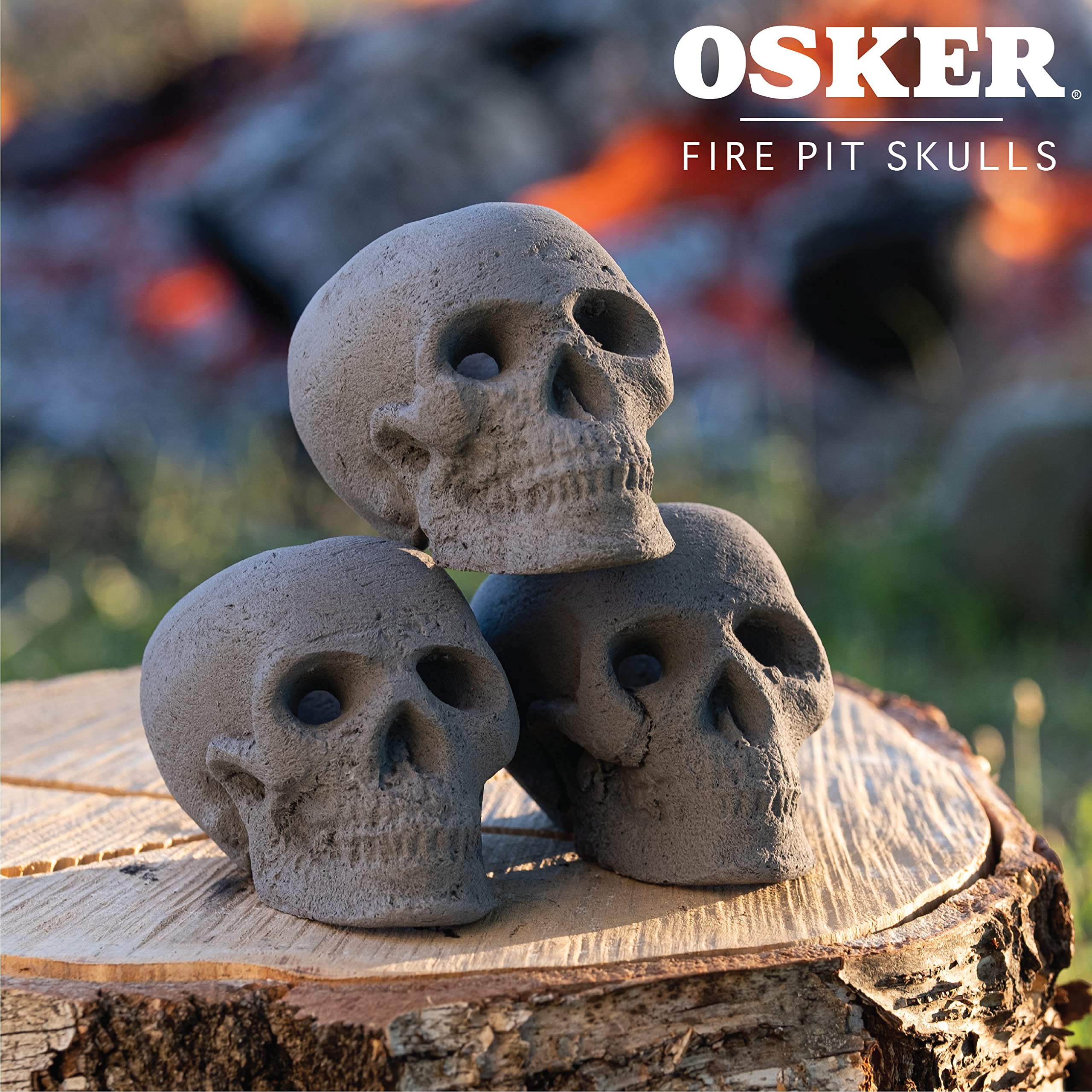 OSKER skull positioned in a firepit with wood fire for realistic performance