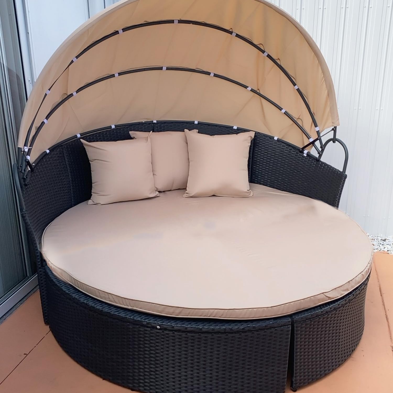 Oslimea lifestyle patio setting showing covered daybed adding curb appeal