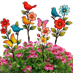 Otoolling front view showing colorful flower, bird, and butterfly stakes enhancing a planter