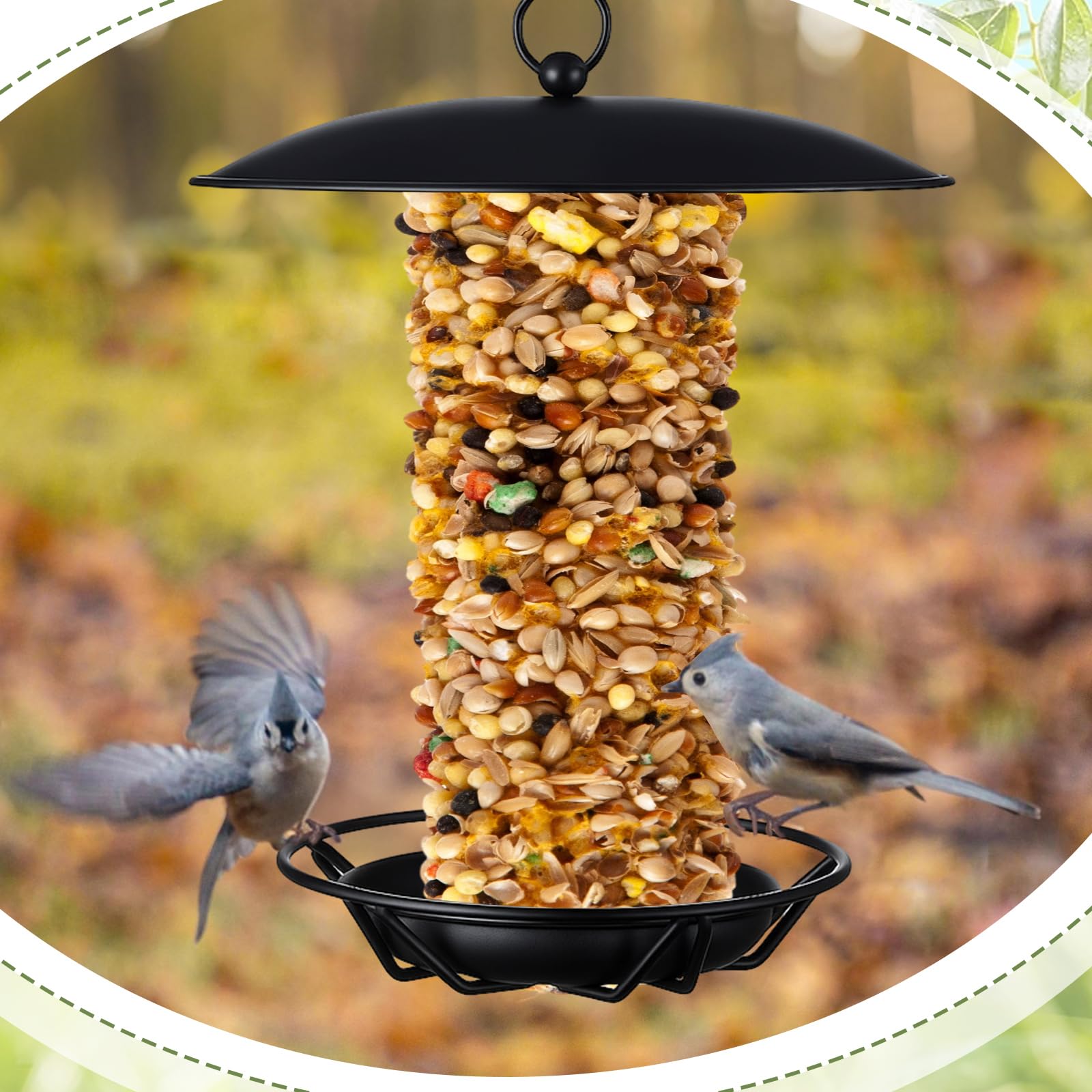Otoolling feeder hanging in garden among branches demonstrating natural placement and bird attraction