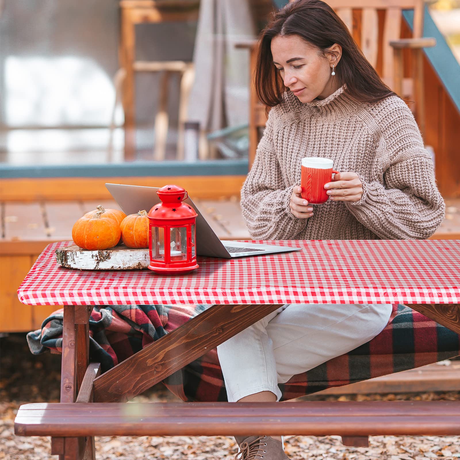 Oudain cover in use on outdoor picnic table adding classic style and waterproof protection