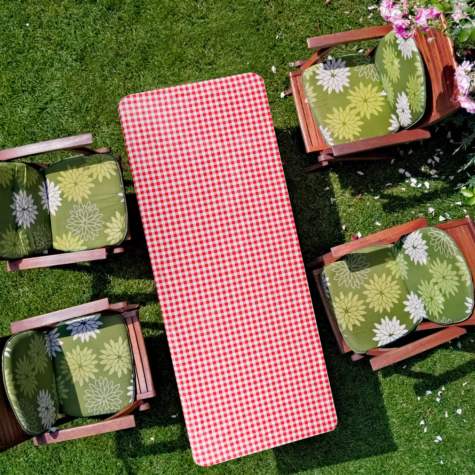 Oudain lifestyle backyard party setup showing decorative checkered table protection