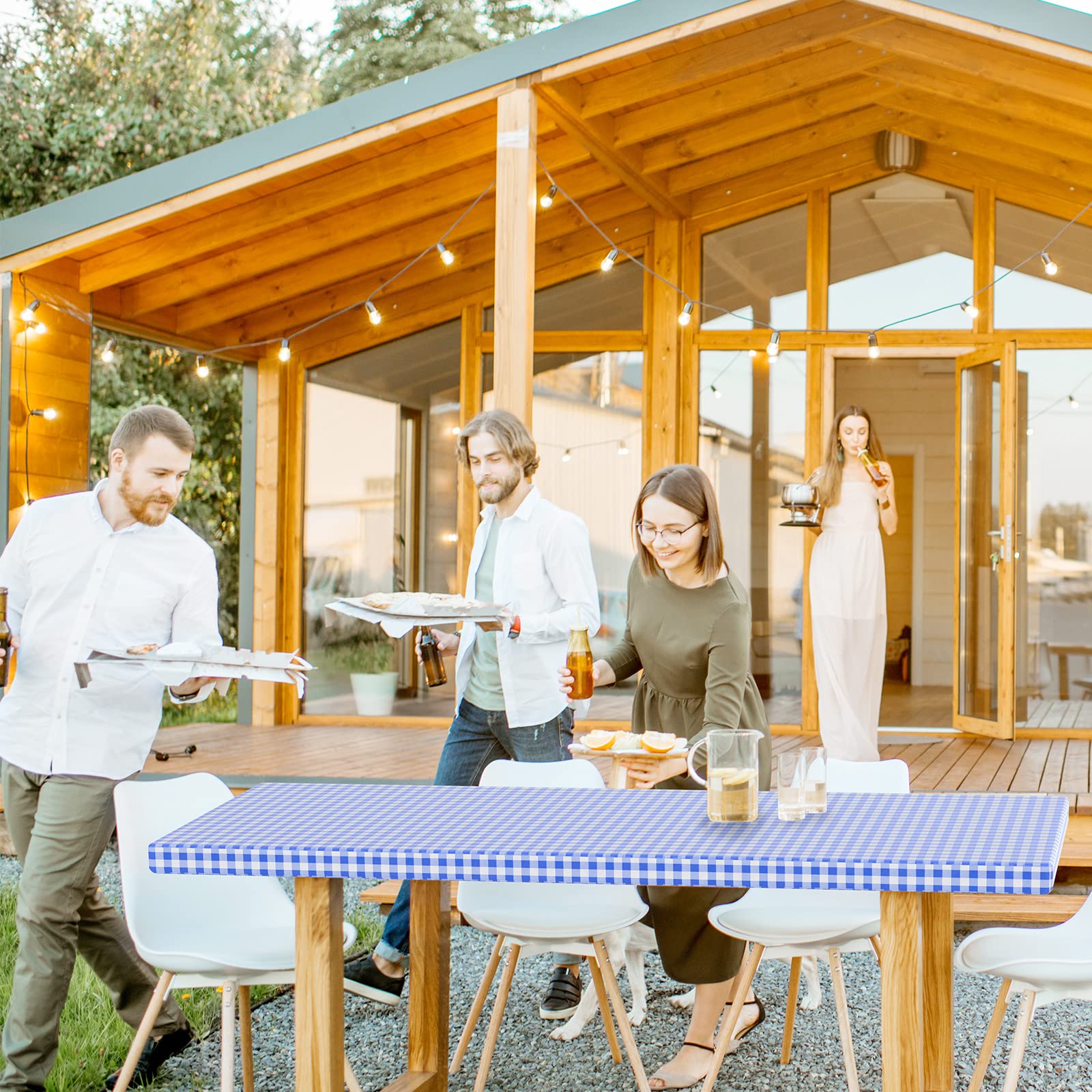 Oudain backyard party with tablecover creating a tidy, easy-clean dining surface benefit