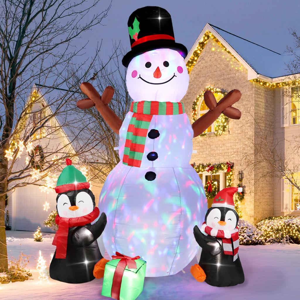 OurWarm front view of snowman and penguins, attracts guests