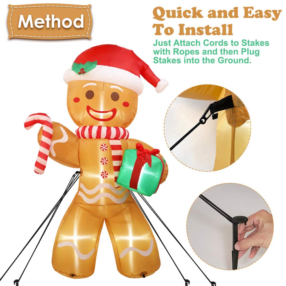 OurWarm gingerbread next to person showing 8ft scale and visual impact