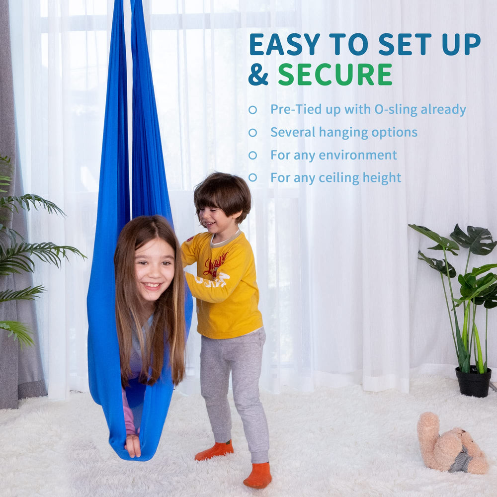 OUTREE swing shown next to a child to demonstrate scale and capacity