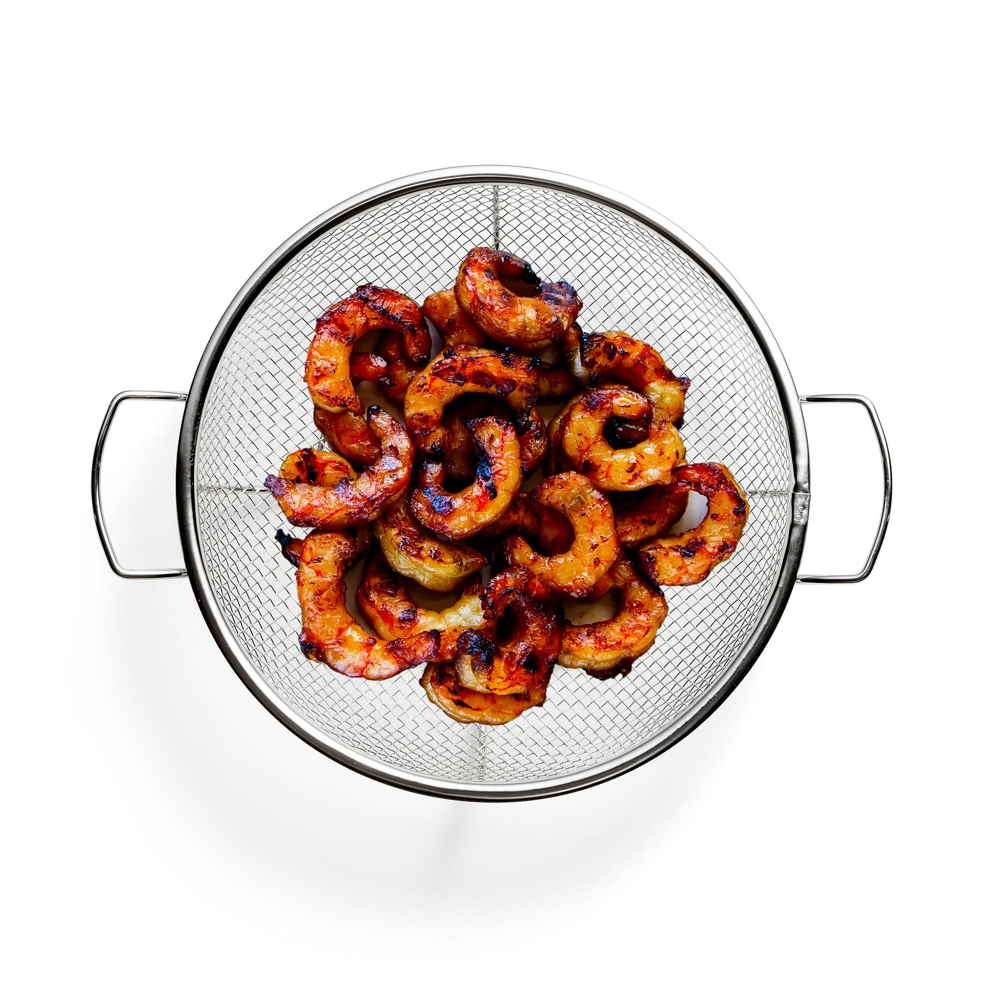 Outset helper handles visible for safe transport and easy flipping on grill