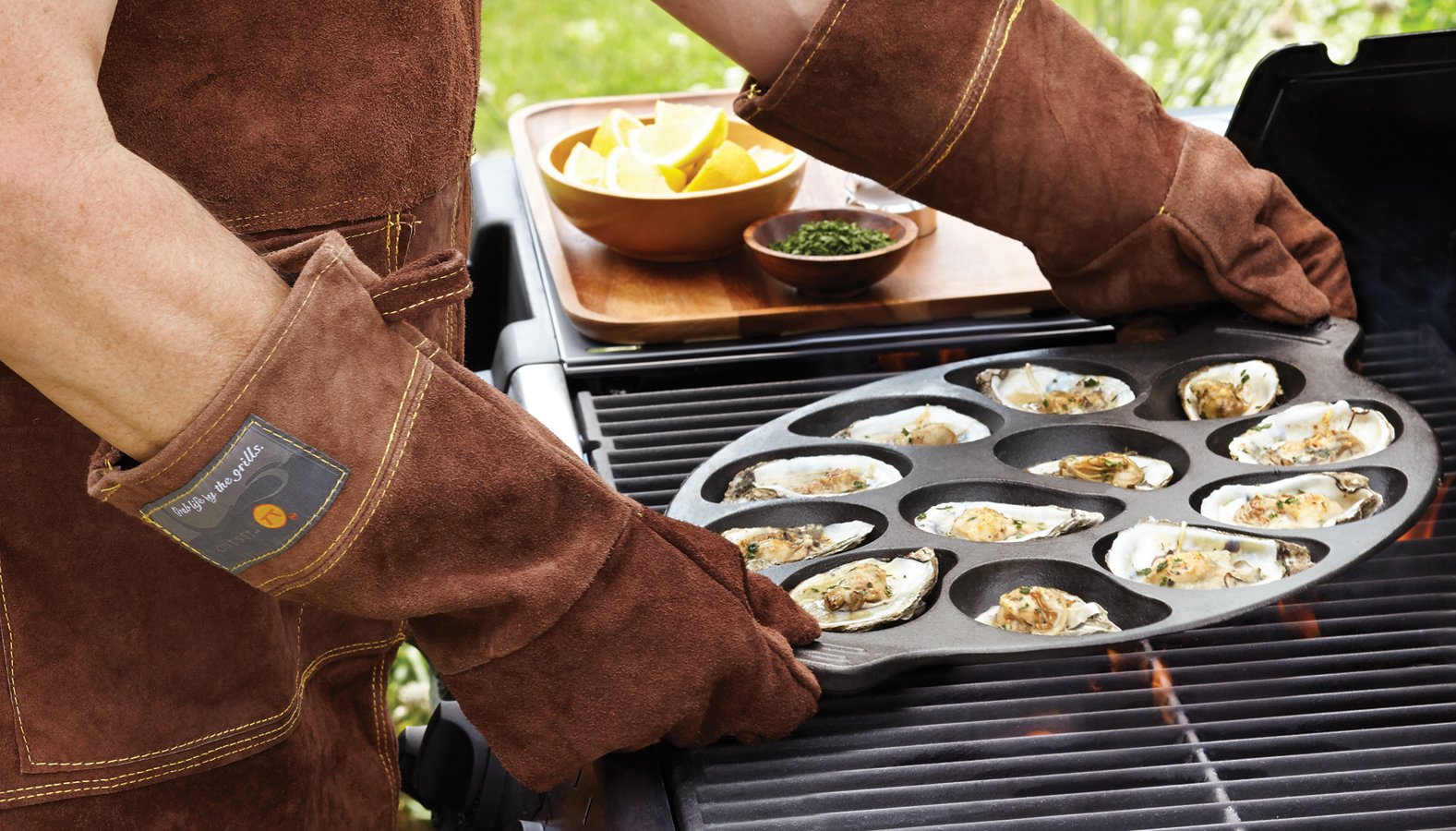 Outset gloves in backyard barbecue scene conveying safe outdoor cooking