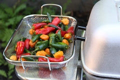 Outset mesh closeup detail highlights perforated surface for better smoke flavor