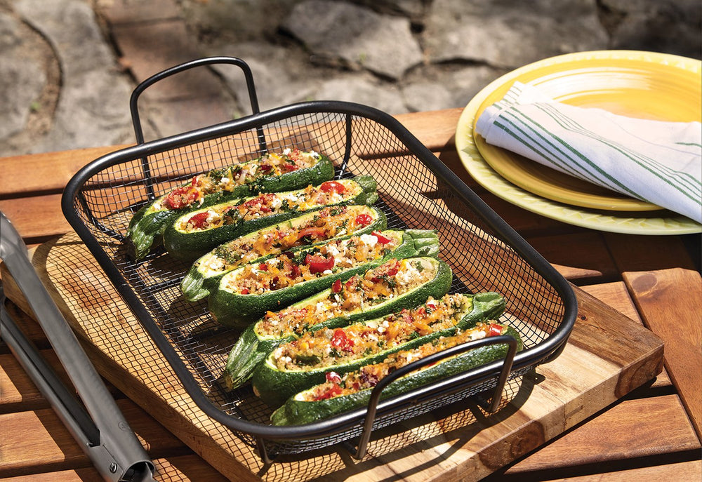 Outset close-up of mesh texture showing perforations that boost smoke flavor and crisping