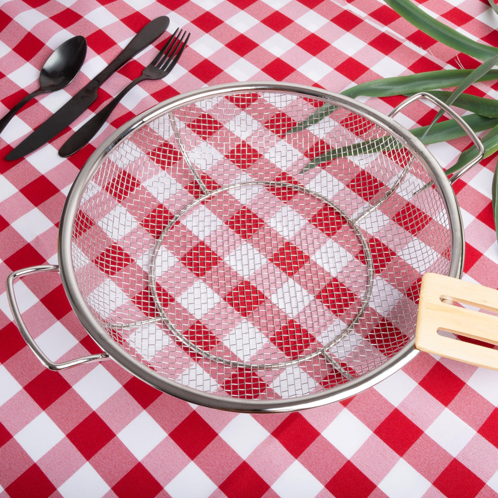 Outset basket beside hand and ruler showing 12x15 size for planning cook space