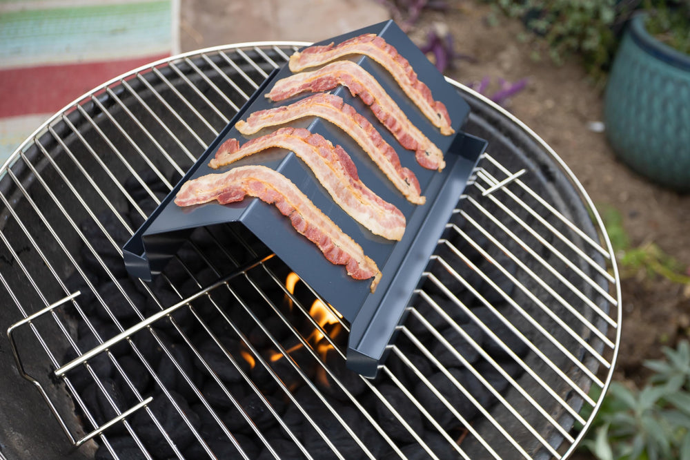 Outset rack beside utensils showing 8.5x10x5-inch size for small grills