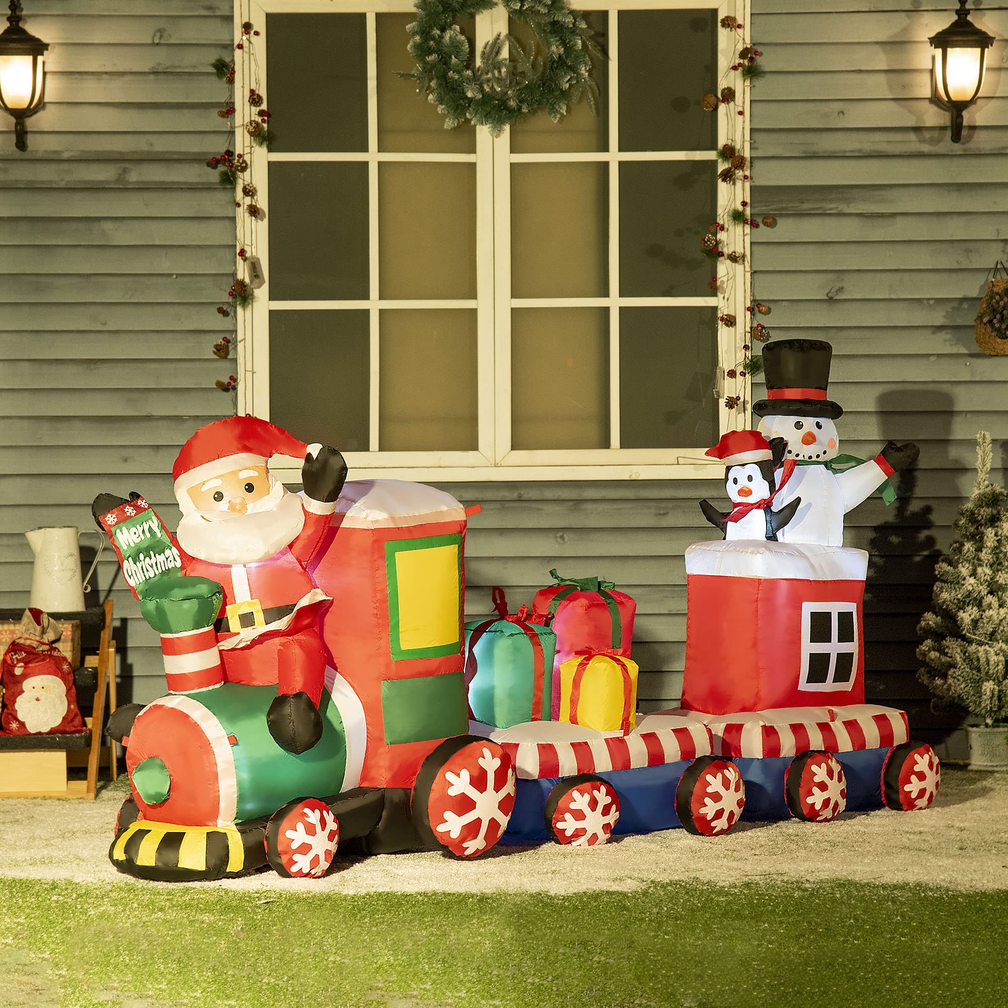 Outsunny front view of train inflatable showing characters and festive scene