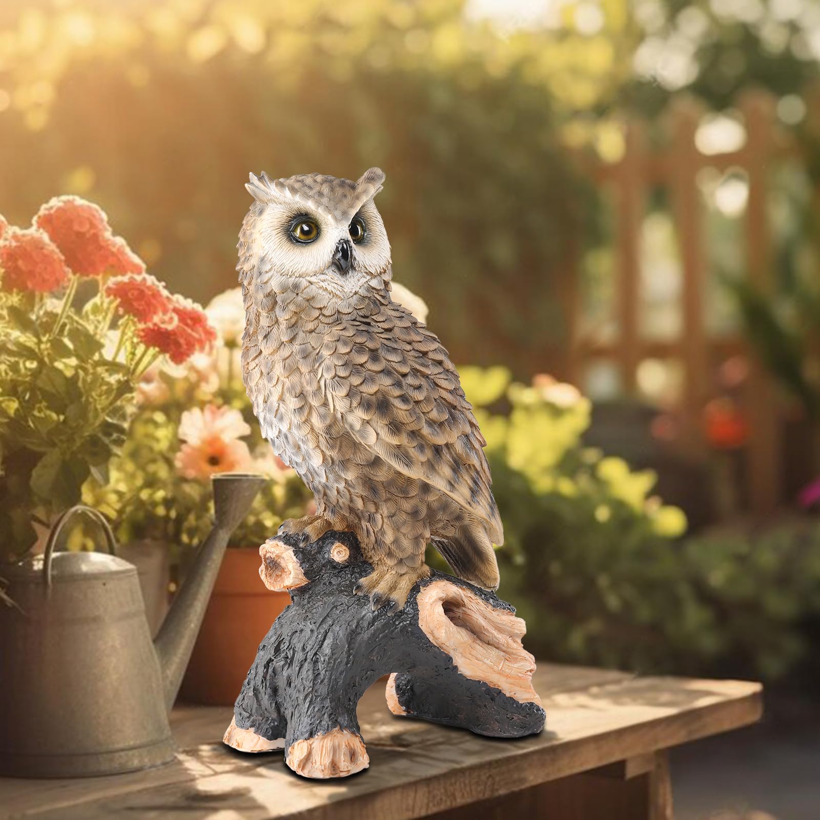 Ovewios owl staged in garden setting adding woodland character to plants