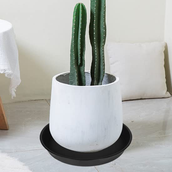 OVZILKI saucer under planter demonstrating stable fit and floor protection