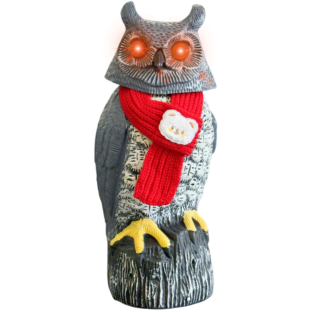 Owlsome front view garden owl on stone showing decorative deterrent