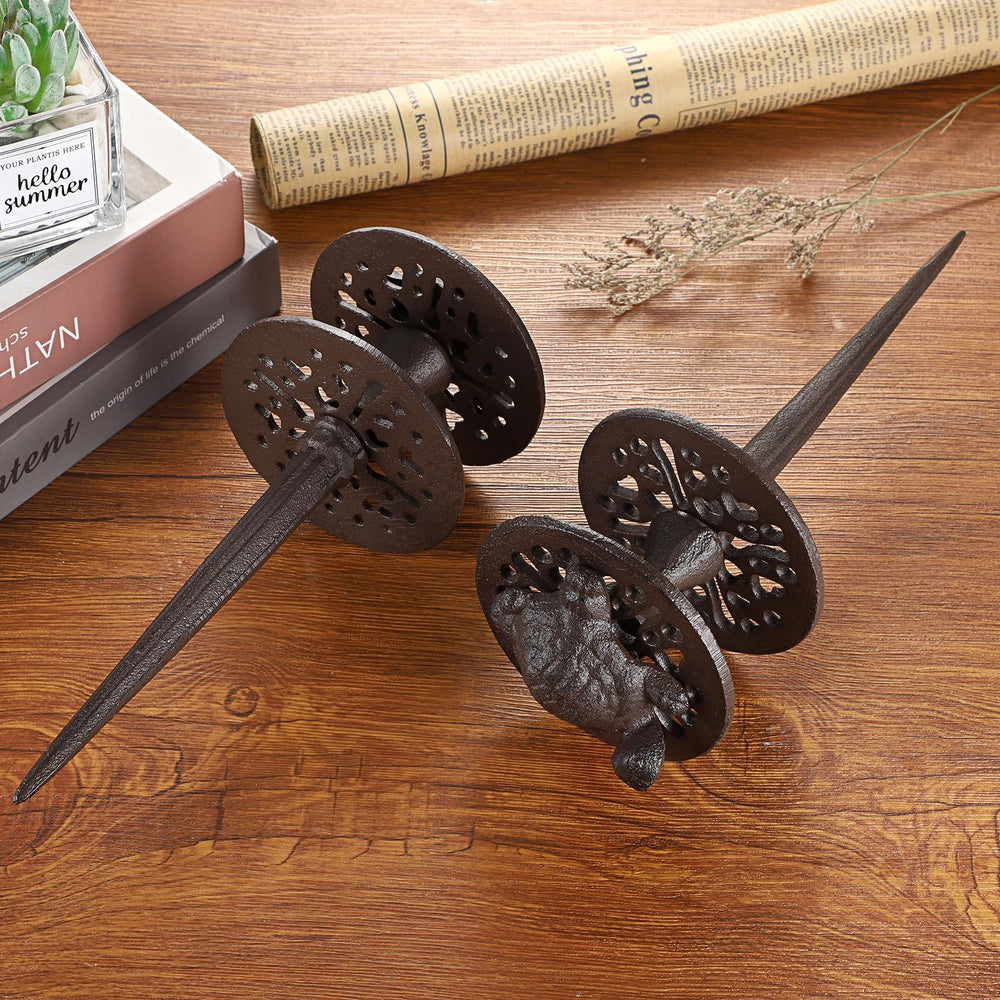OwnMy lifestyle garden scene with stakes guiding hose and enhancing curb appeal