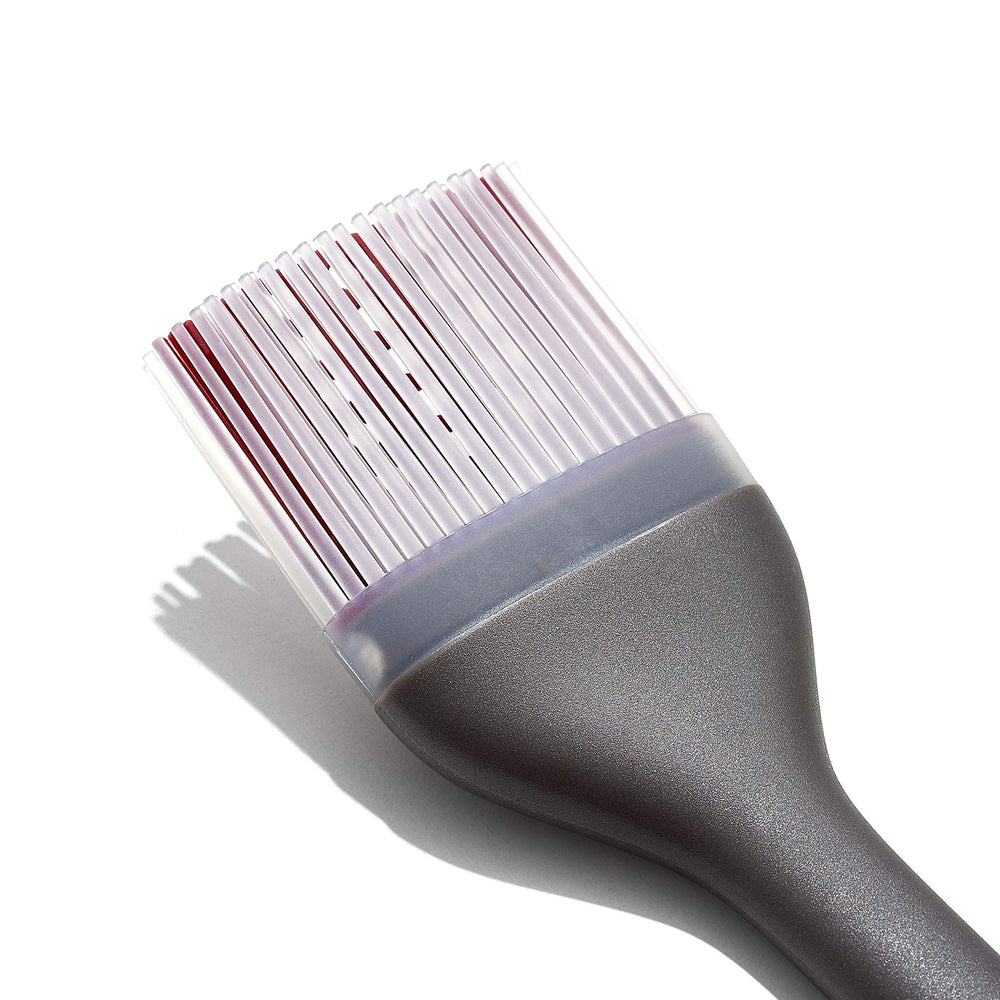 OXO angled brush head profile showing angle for better reach and cleaner strokes