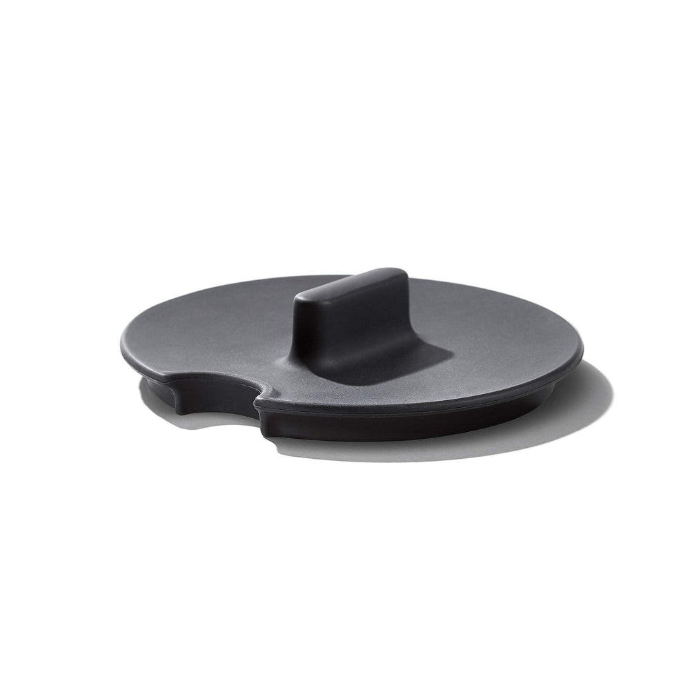 OXO lifestyle backyard grill scene showing practical use during summer cookout