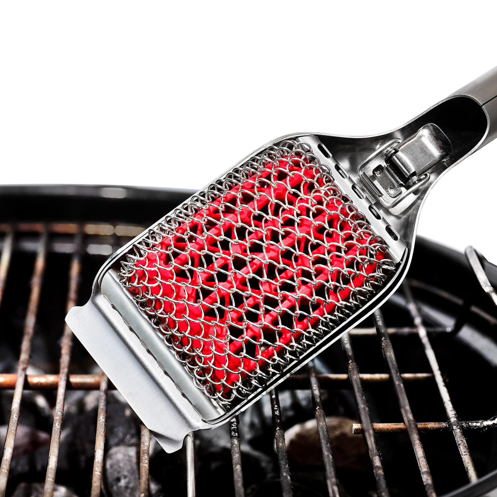 OXO brush in use on hot grill illustrating heat-resistant cleaning advantage