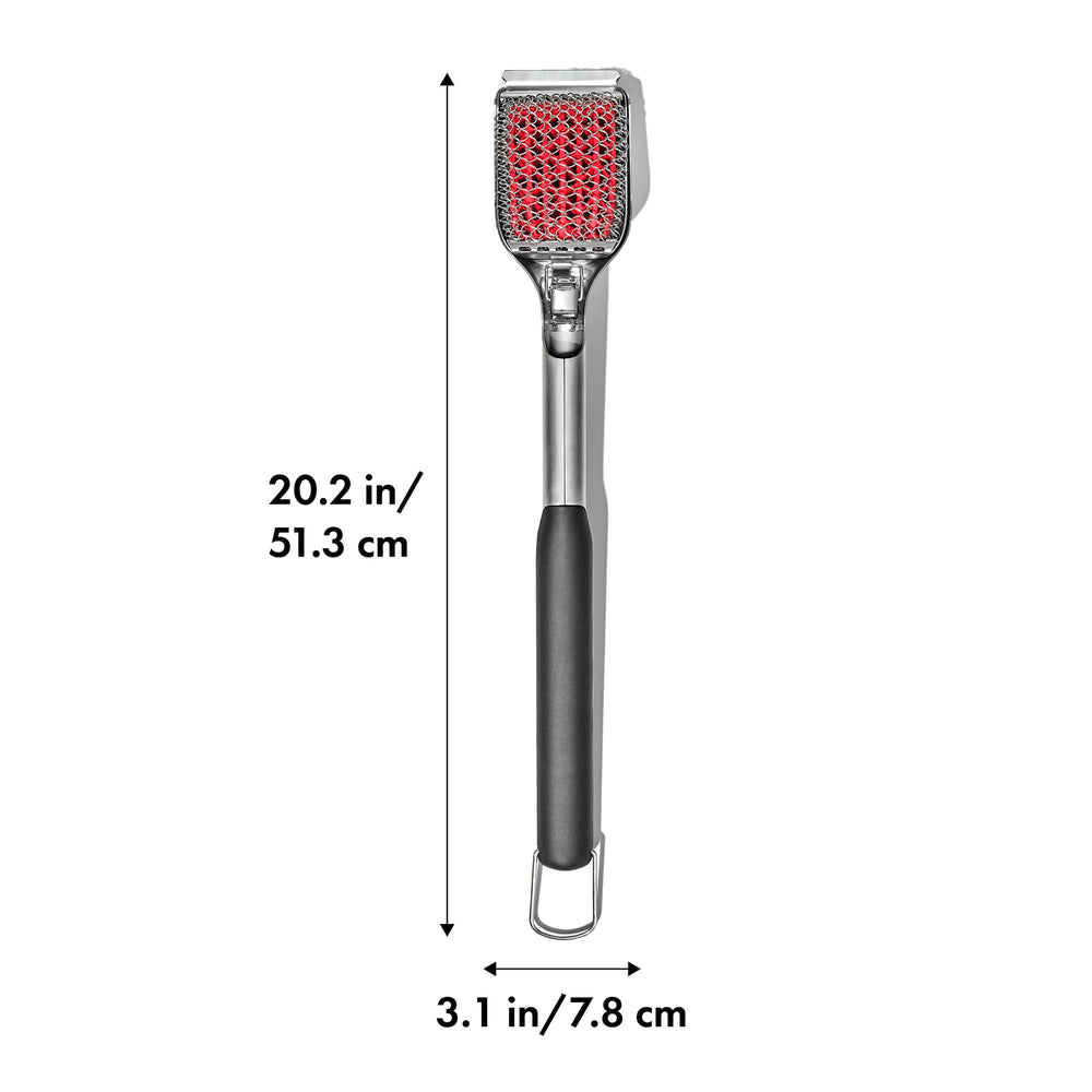 OXO brush next to spatula for scale showing long reach and safe leverage