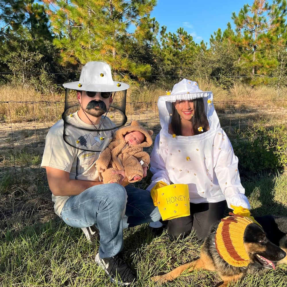 PANMAX couple wearing bee costumes in garden showcasing event-ready protection