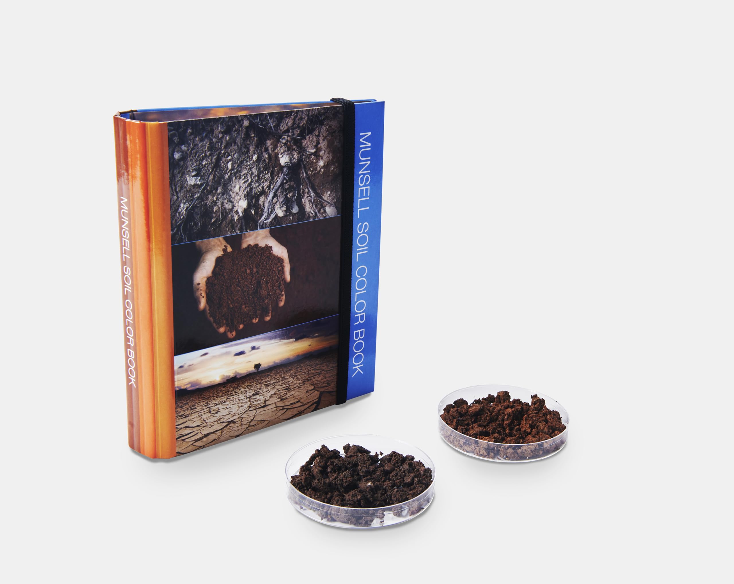 Pantone Munsell soil book opened to multiple hue charts, helping accurate onsite matches