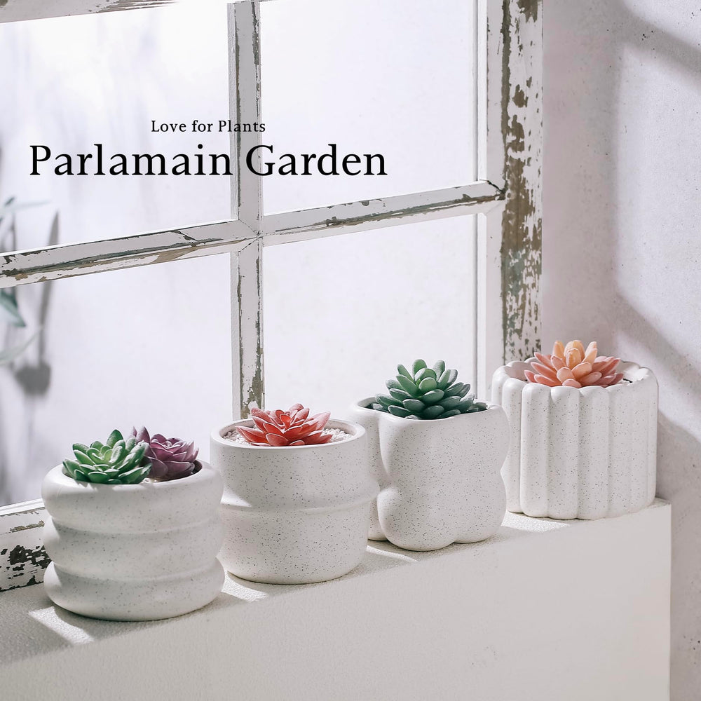 Parlamain planters on a windowsill with herbs showing compact size and easy indoor use
