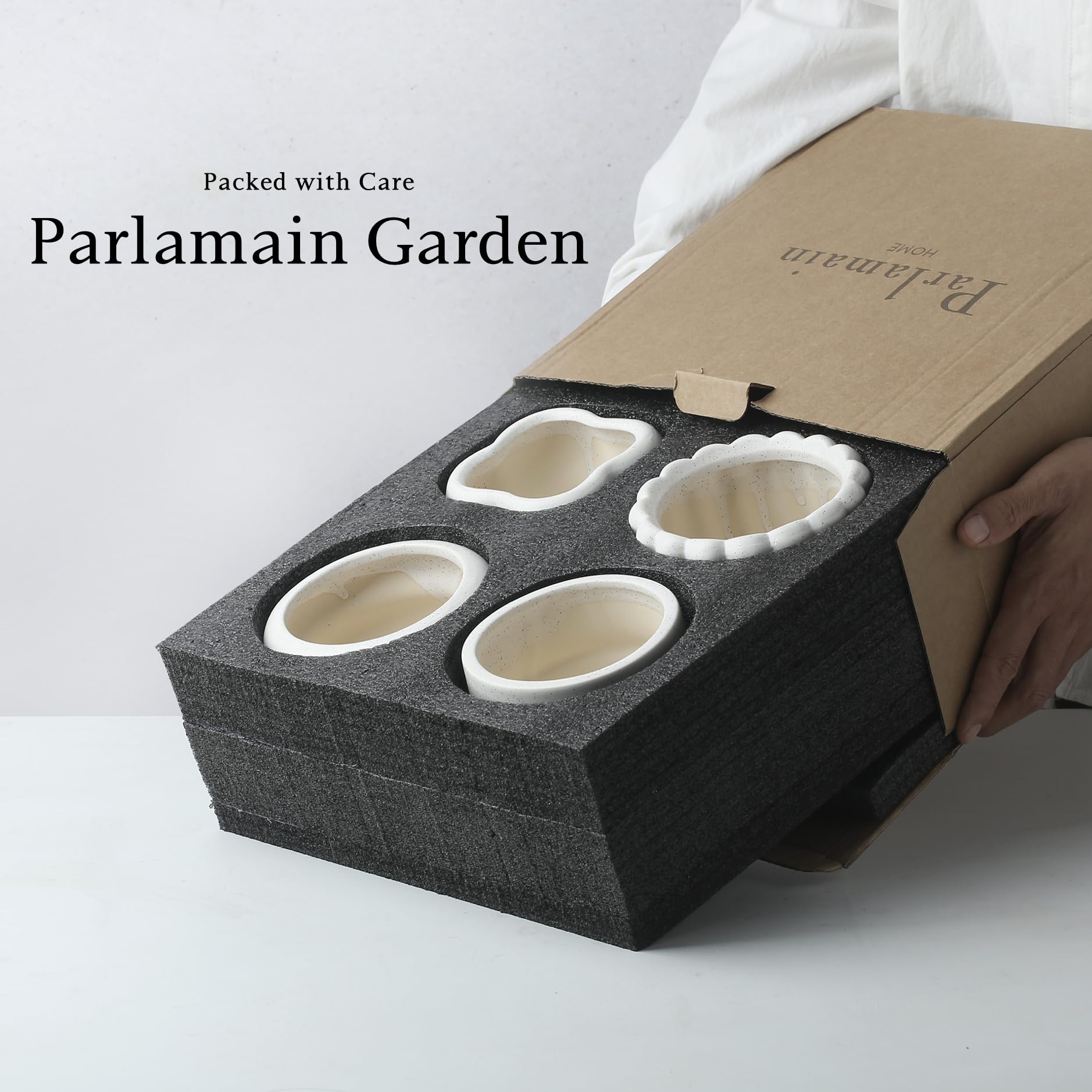 Parlamain planters styled on a living-room shelf showing decorative impact and subtle contrast
