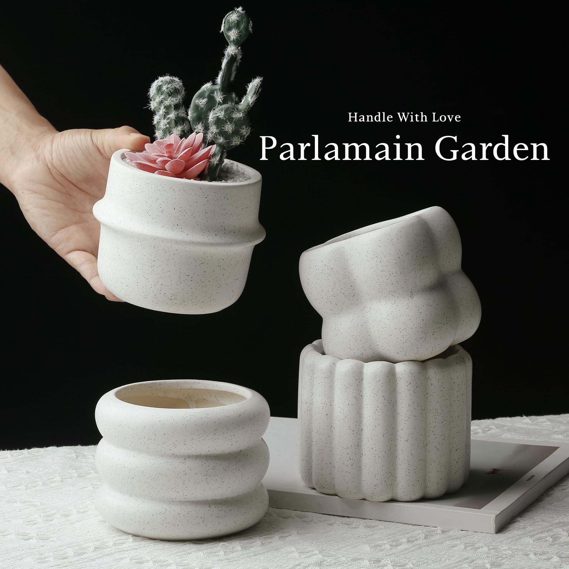 Parlamain planters held in hand to show scale and portability for small-space styling