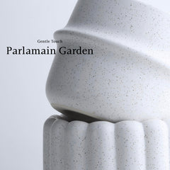 Parlamain side profile showing four unique organic-shaped planters that add sculptural interest