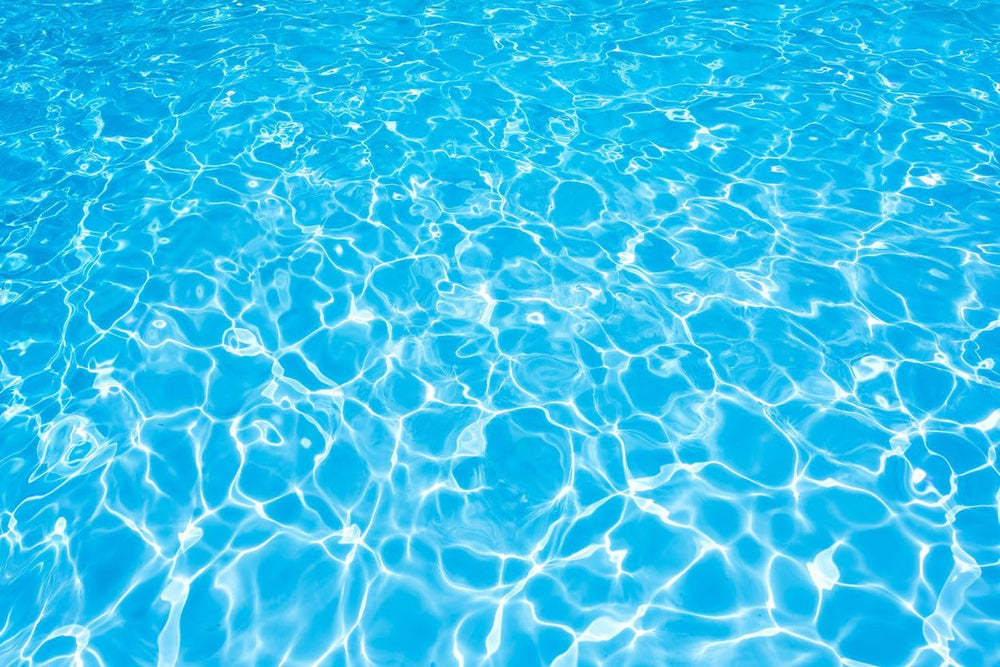Party Pool close-up of concentrate bottle showing clear texture and easy pour benefit