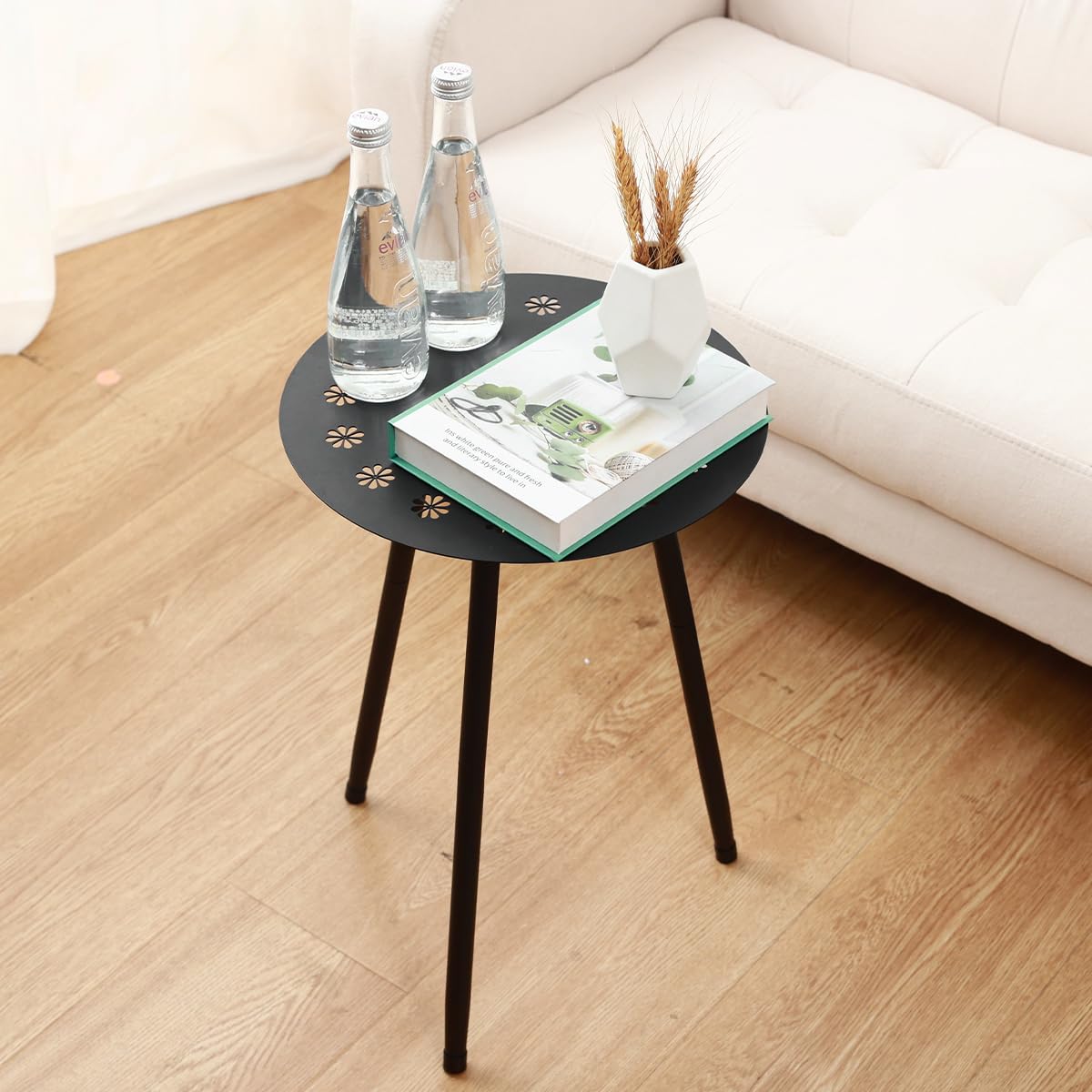 Party Zealot indoor living room setup with table used as end table beside sofa