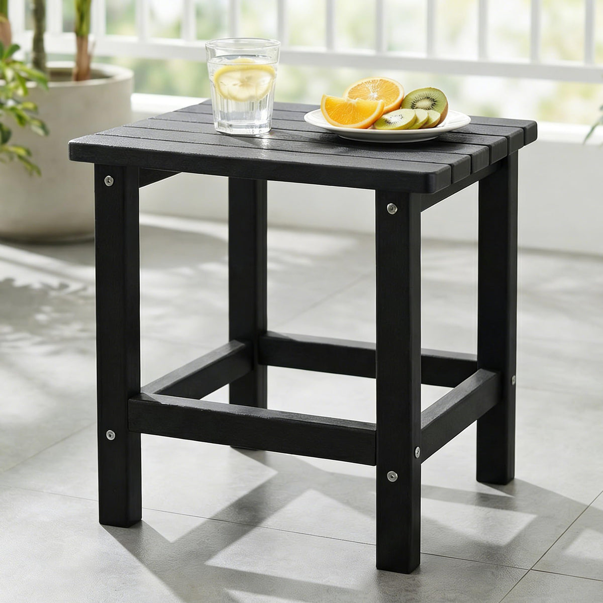 PASAMIC front view of black side table showing modern profile and durable build