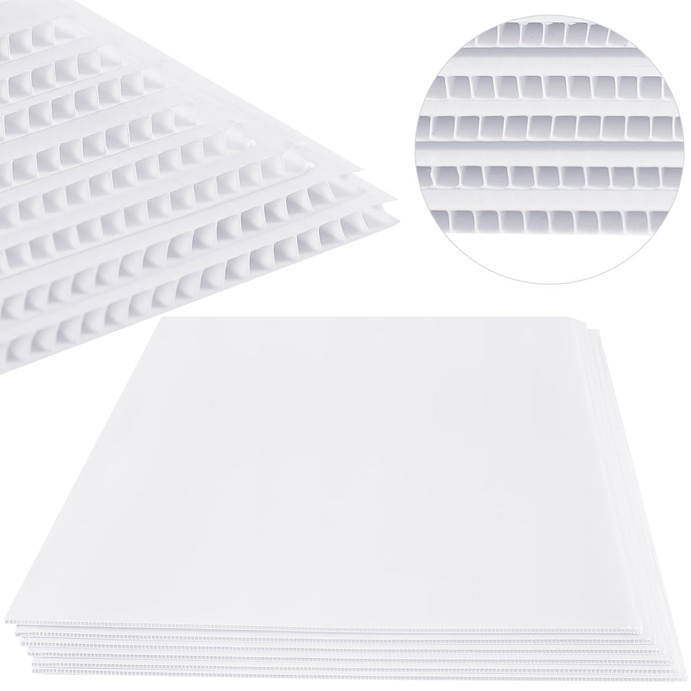Patelai front view of six white corrugated plastic sheets showing clean double-sided surface and size