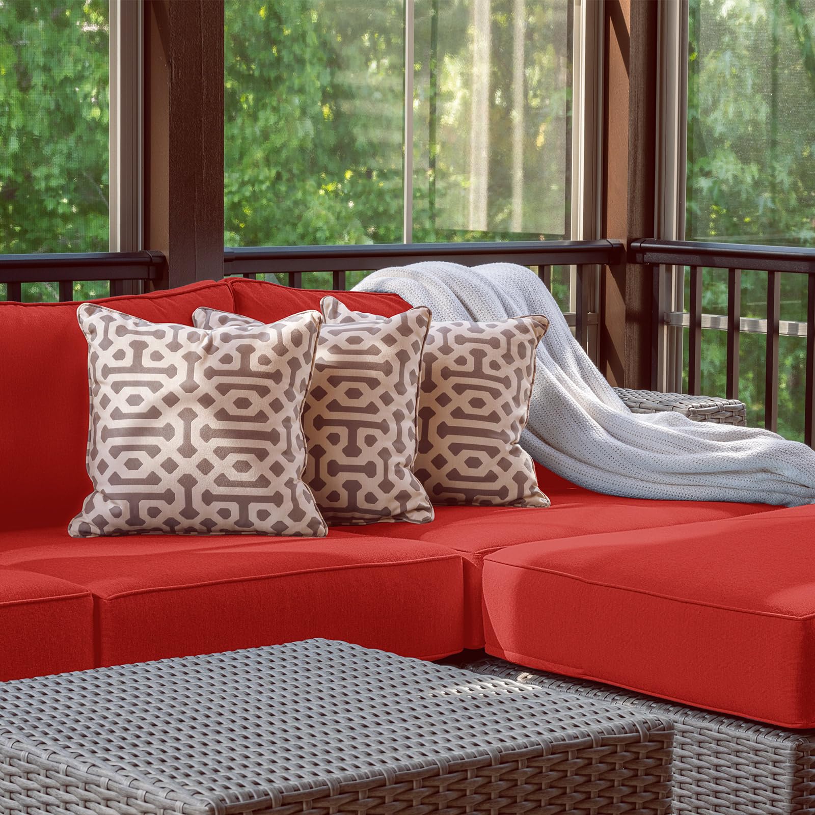Patelai lifestyle patio scene with red covers creating vibrant coordinated seating benefit